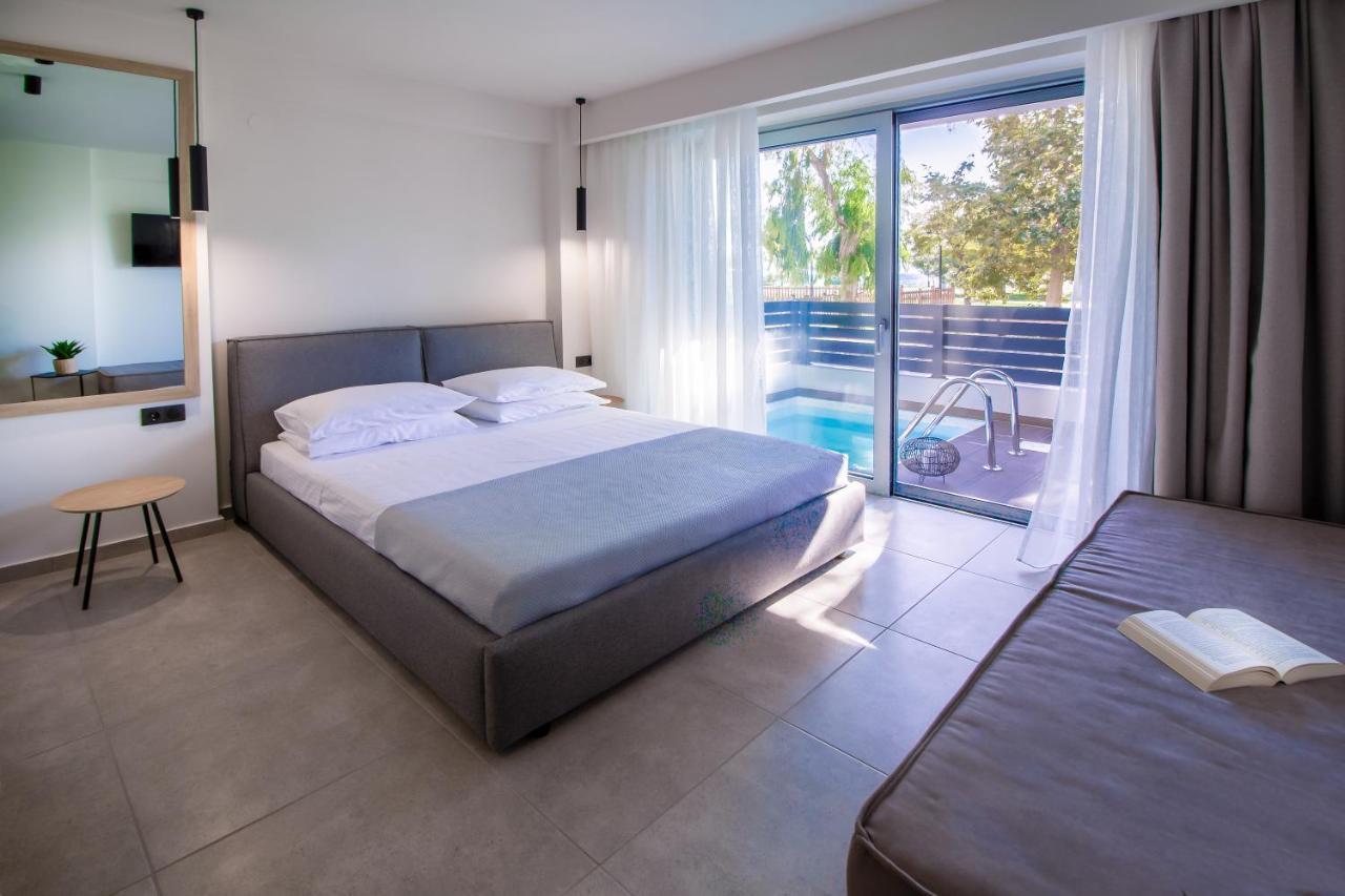 Aelia Seaside Luxury Suites Nea Karvali Exterior photo